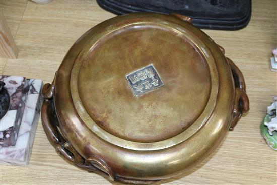 A large Chinese bronze dragon censer, Xuande mark length 38cm